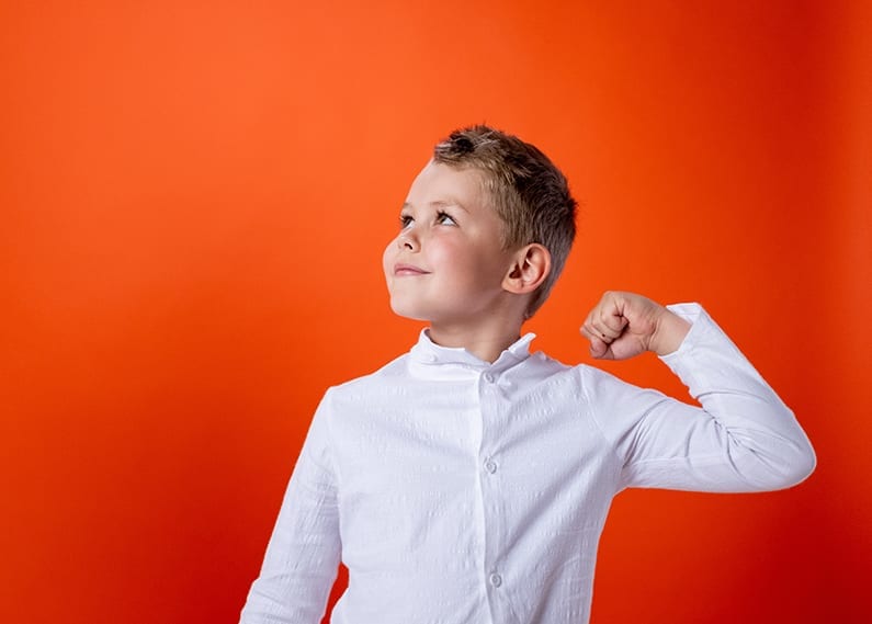boy with red background